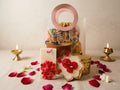 Sneh Potli Rakhi gift hamper with scented candle and urli candle for gifting
