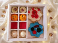 Rakhi Utsav Hamper | Candles, Sweets, Rakhi & Urli Gift Set