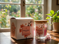 Fresh and Floral premium fragrance candle by Melange Aroma, hand-poured in a natural soy wax blend, displayed beautifully with delicate botanical petals.